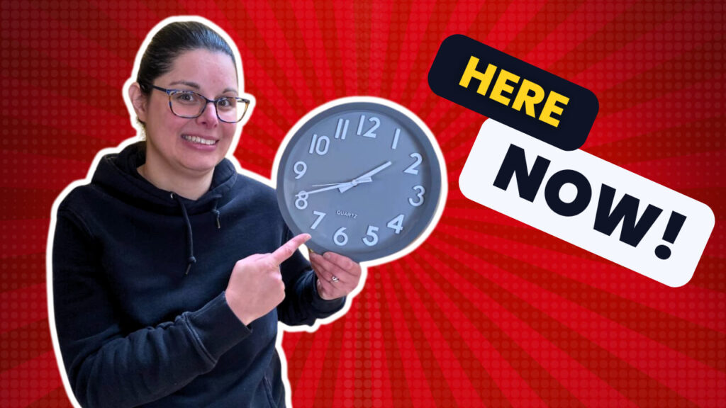 Kim from the We Are Recreated Podcast pointing to a clock to indicate that our new identity in Christ is here now.